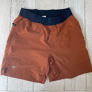 Upgrade Your Gym Wardrobe: Fabletics Orange Gym Shorts (Used Size S)